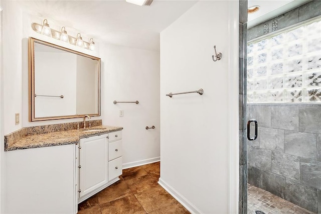 bathroom featuring vanity and walk in shower