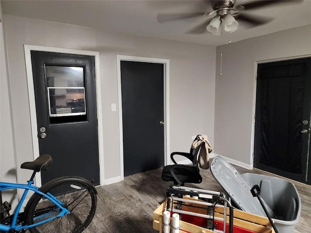 interior space featuring ceiling fan