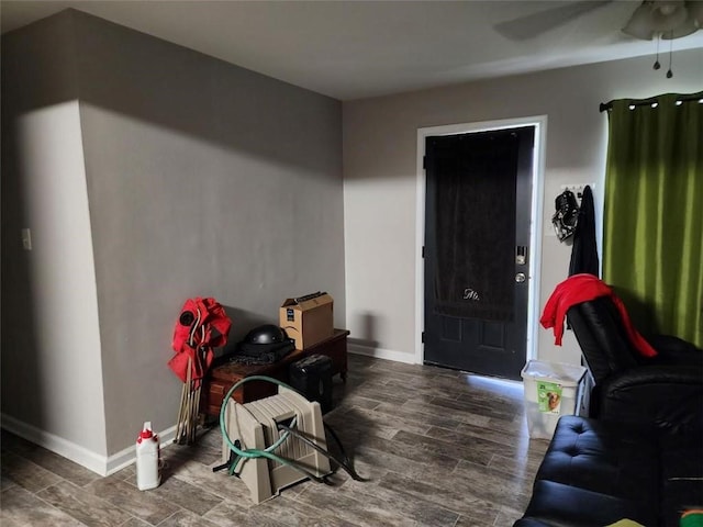 living room featuring ceiling fan