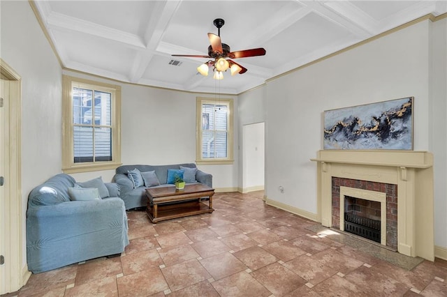 living room with coffered ceiling, a ceiling fan, baseboards, beamed ceiling, and a fireplace with flush hearth