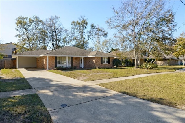 ranch-style house with a carport and a front lawn