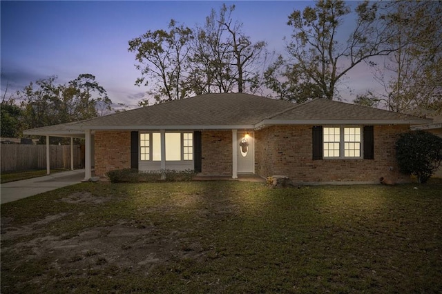 ranch-style house with a carport