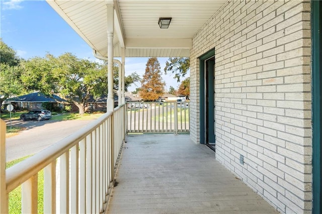 balcony featuring a porch