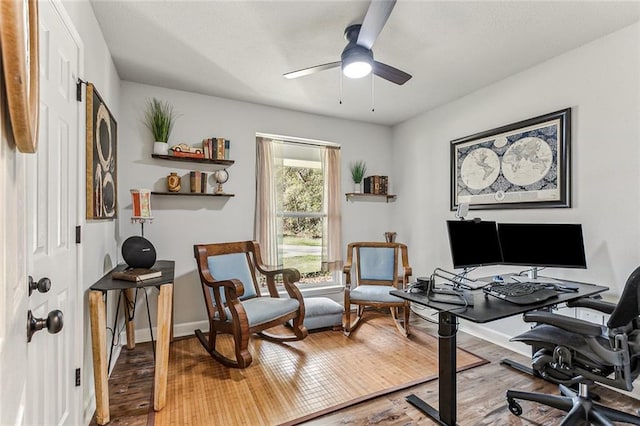 office area with ceiling fan and wood-type flooring