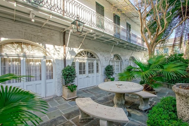 view of patio / terrace featuring a balcony