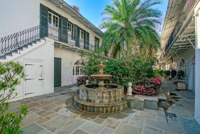 view of patio / terrace with a balcony