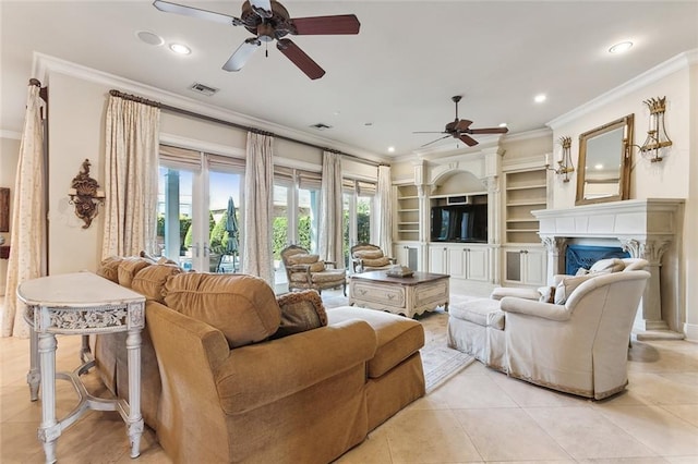 tiled living room featuring built in shelves, ceiling fan, ornamental molding, and french doors