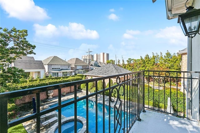 balcony with an in ground hot tub