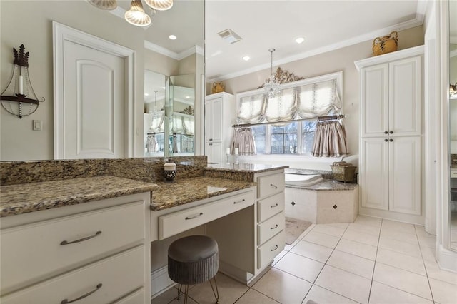 bathroom featuring tile patterned floors, a relaxing tiled tub, crown molding, and a notable chandelier