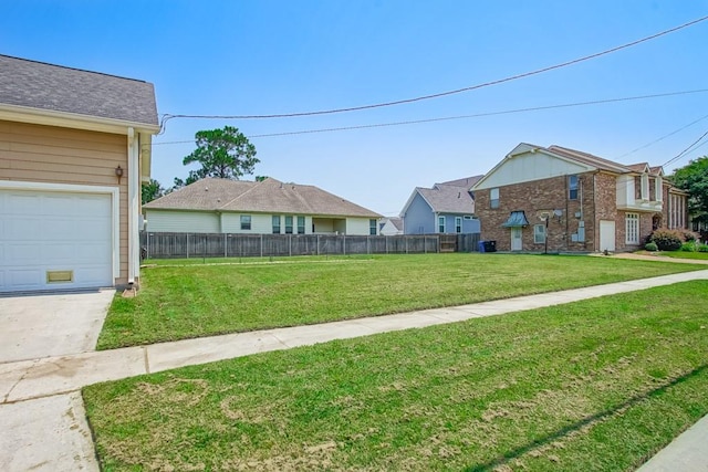 view of yard with a garage