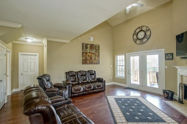 living room featuring a fireplace, ornamental molding, dark hardwood / wood-style floors, and lofted ceiling