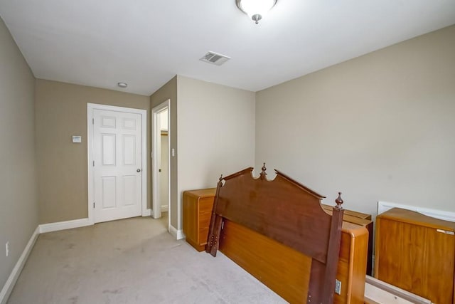 interior space featuring light colored carpet