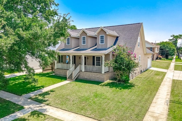 view of front of house with a porch and a front yard