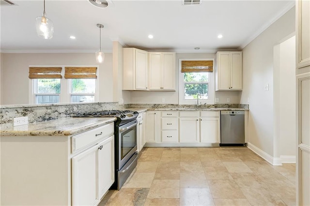 kitchen with sink, hanging light fixtures, light stone counters, crown molding, and appliances with stainless steel finishes