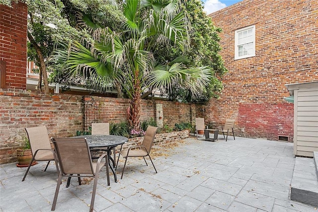 view of patio with outdoor dining area