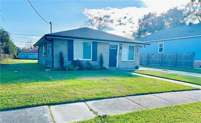 view of front facade with a front lawn