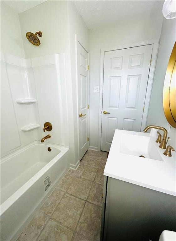 bathroom featuring vanity and tub / shower combination