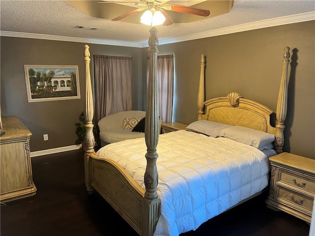 bedroom featuring ceiling fan, a textured ceiling, and ornamental molding