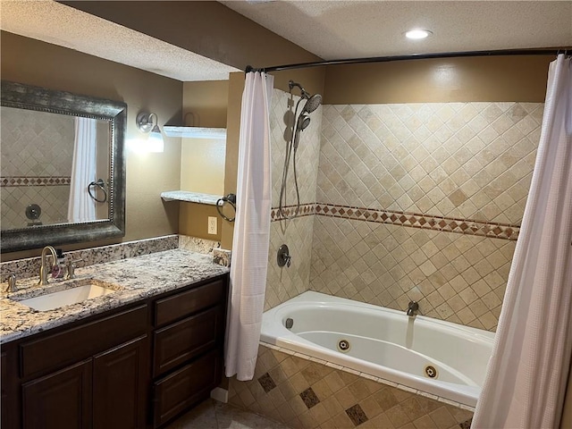 bathroom featuring vanity, a textured ceiling, and shower / tub combo with curtain