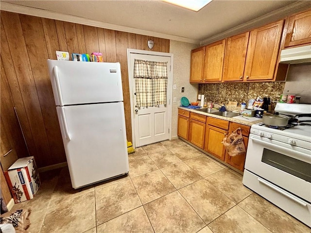 kitchen with sink, white appliances, decorative backsplash, and light tile patterned floors