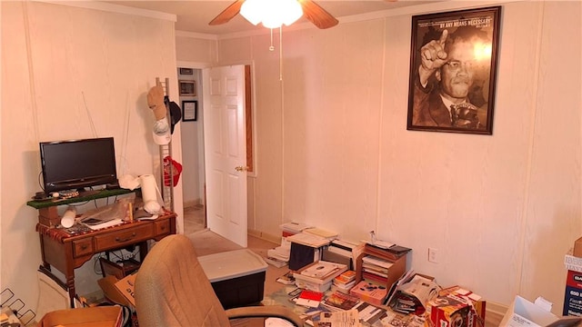 office space with ceiling fan and crown molding