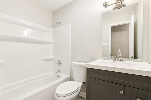 full bathroom featuring vanity, toilet, and bathtub / shower combination