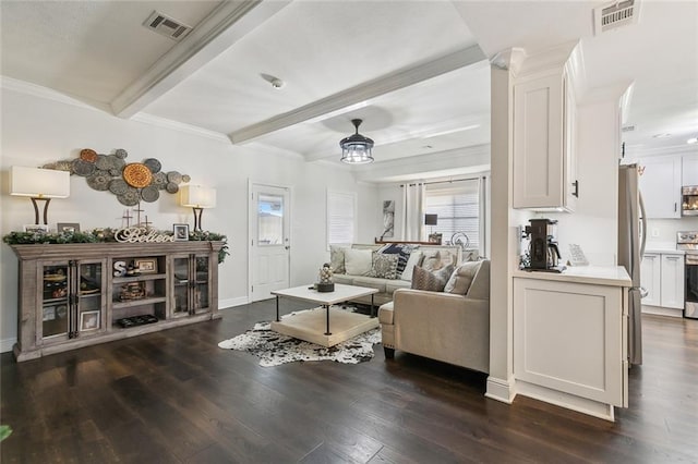 living room featuring beam ceiling, ornamental molding, and dark wood-type flooring