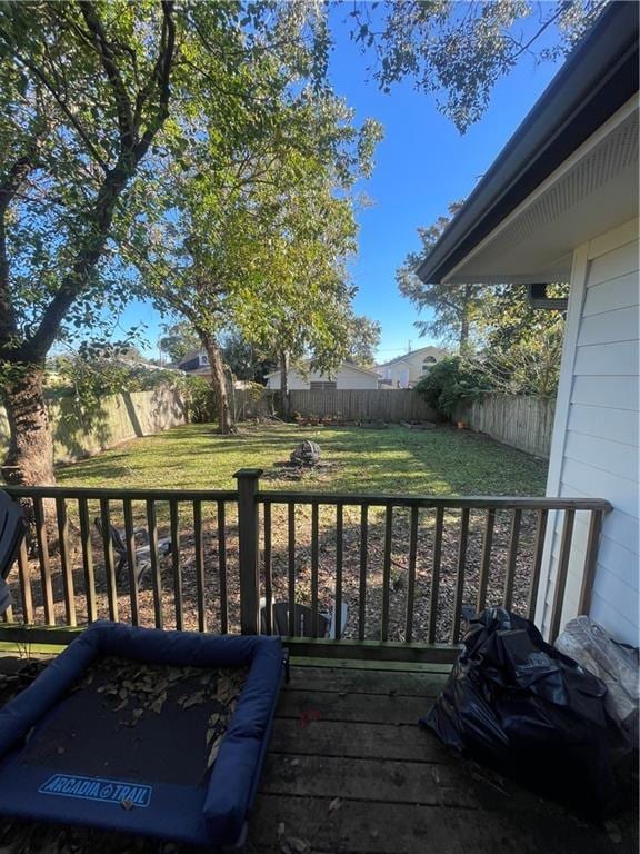 wooden deck featuring area for grilling