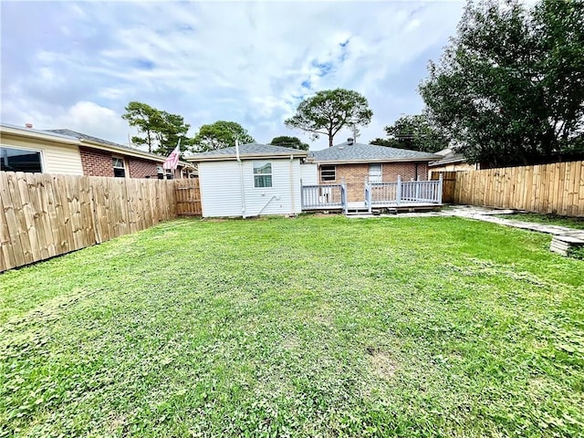 view of yard featuring a deck