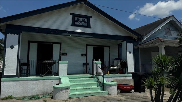 bungalow-style house with covered porch