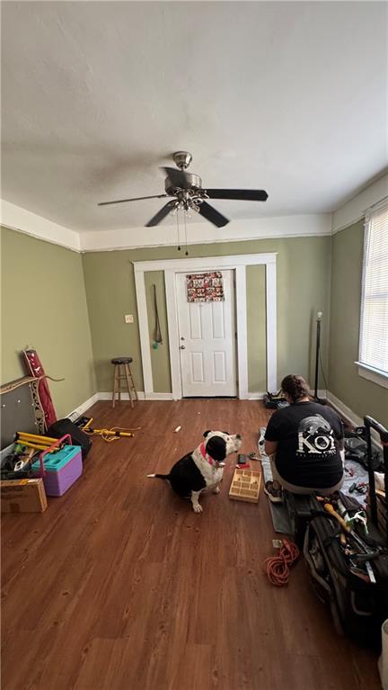 recreation room with hardwood / wood-style flooring and ceiling fan