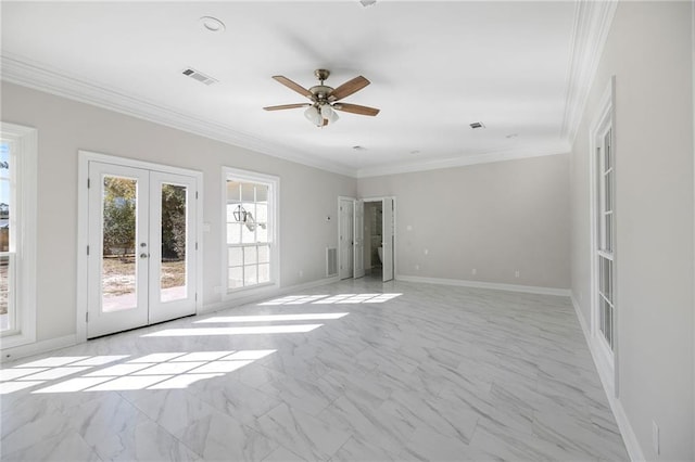 spare room with ceiling fan, ornamental molding, and french doors