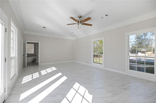 interior space with ceiling fan and ornamental molding