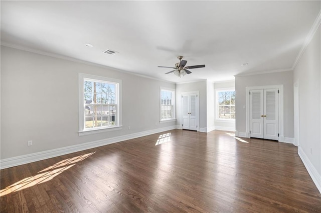 unfurnished room with ceiling fan, dark hardwood / wood-style floors, and ornamental molding