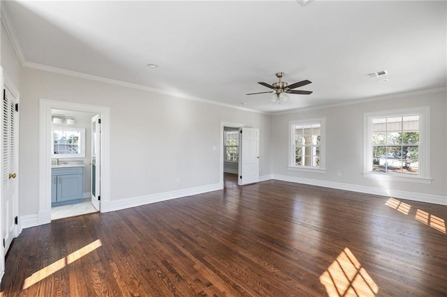 unfurnished living room with crown molding, dark hardwood / wood-style flooring, and ceiling fan