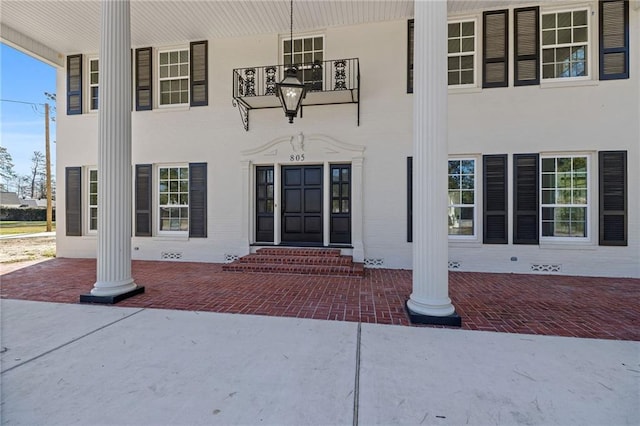 entrance to property with covered porch