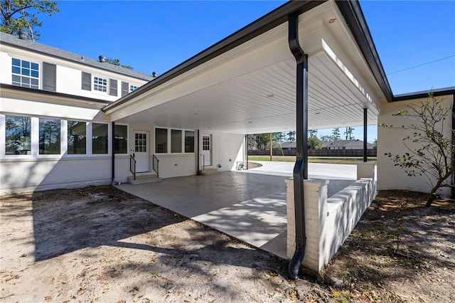 view of patio / terrace featuring a carport