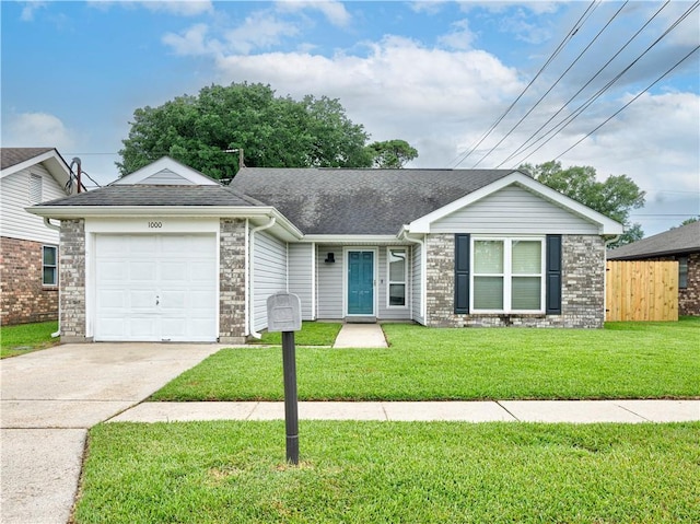 single story home with a front yard and a garage