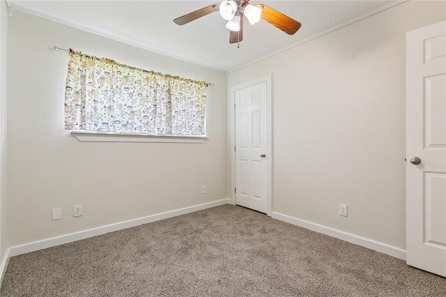 full bathroom featuring shower / tub combo, ornamental molding, vanity, tile patterned flooring, and toilet