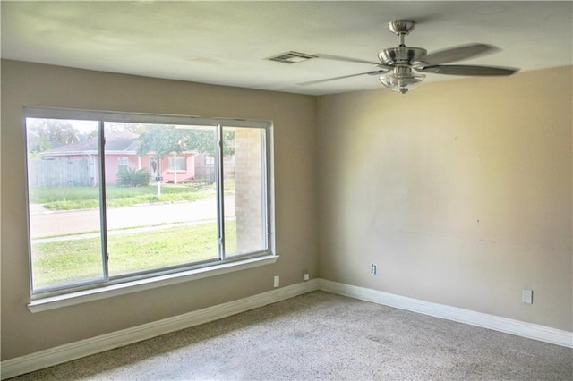 spare room featuring ceiling fan