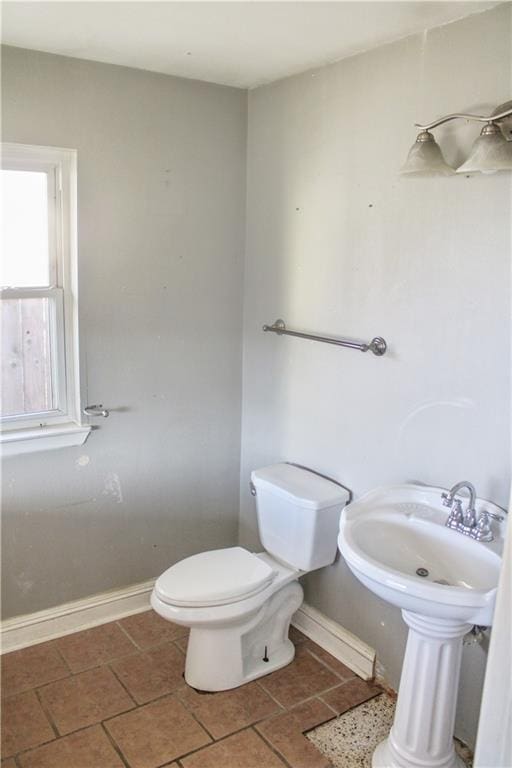 bathroom with toilet and sink