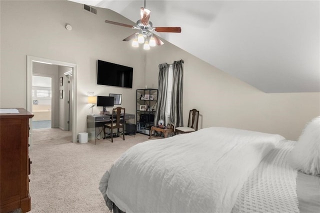 bedroom featuring ceiling fan, vaulted ceiling, and light carpet