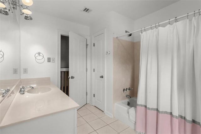 bathroom with tile patterned flooring, vanity, and shower / bath combination with curtain