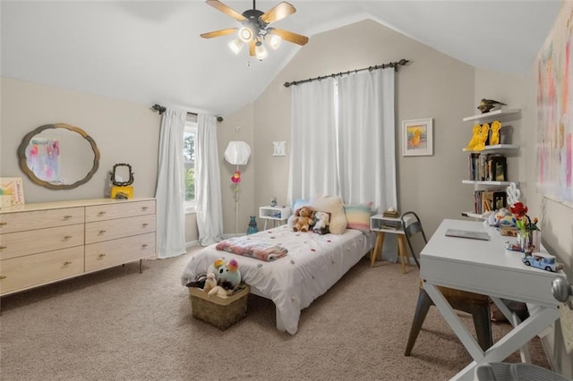 bedroom with carpet floors, vaulted ceiling, and ceiling fan