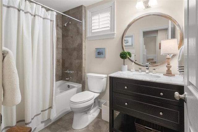 full bathroom featuring vanity, toilet, tile patterned flooring, and shower / bath combo with shower curtain