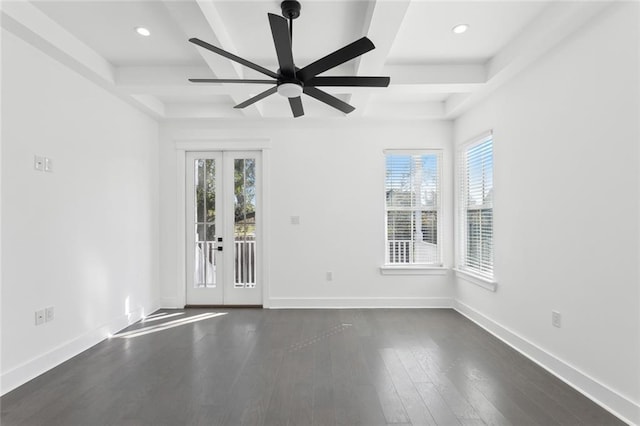 unfurnished room featuring french doors, coffered ceiling, ceiling fan, beam ceiling, and dark hardwood / wood-style floors