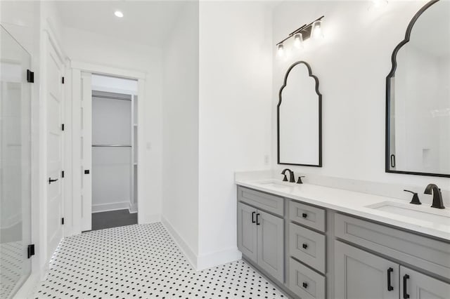 bathroom with vanity and an enclosed shower