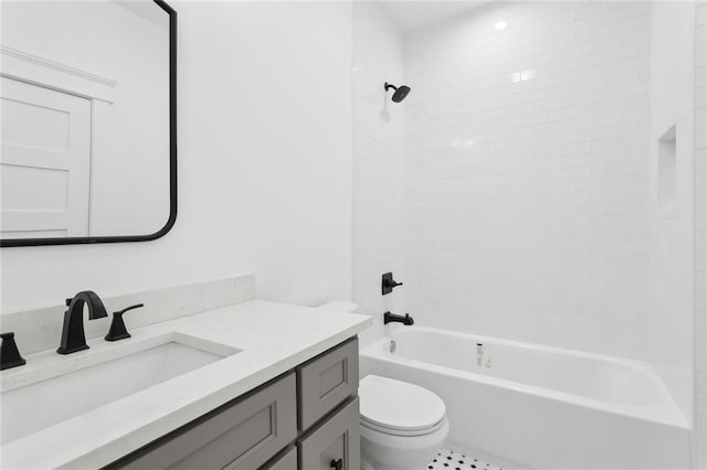 full bathroom with vanity, toilet, and  shower combination