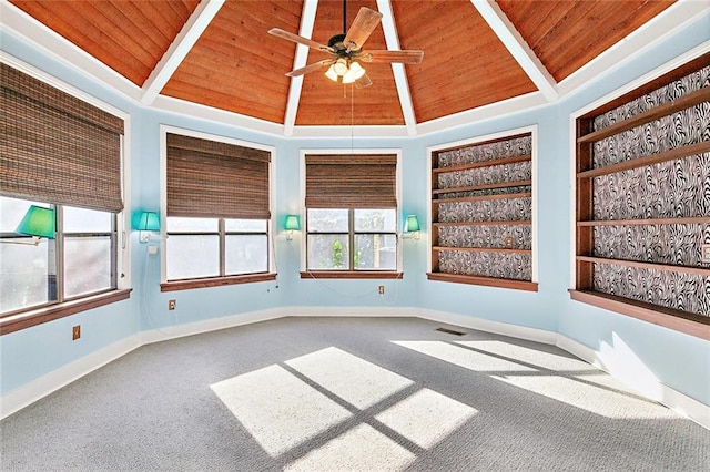 spare room featuring carpet flooring, high vaulted ceiling, ceiling fan, and wood ceiling