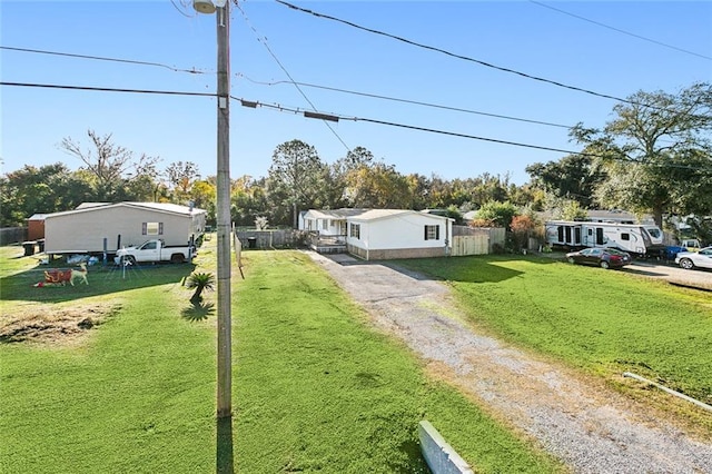 view of front of home featuring a front lawn